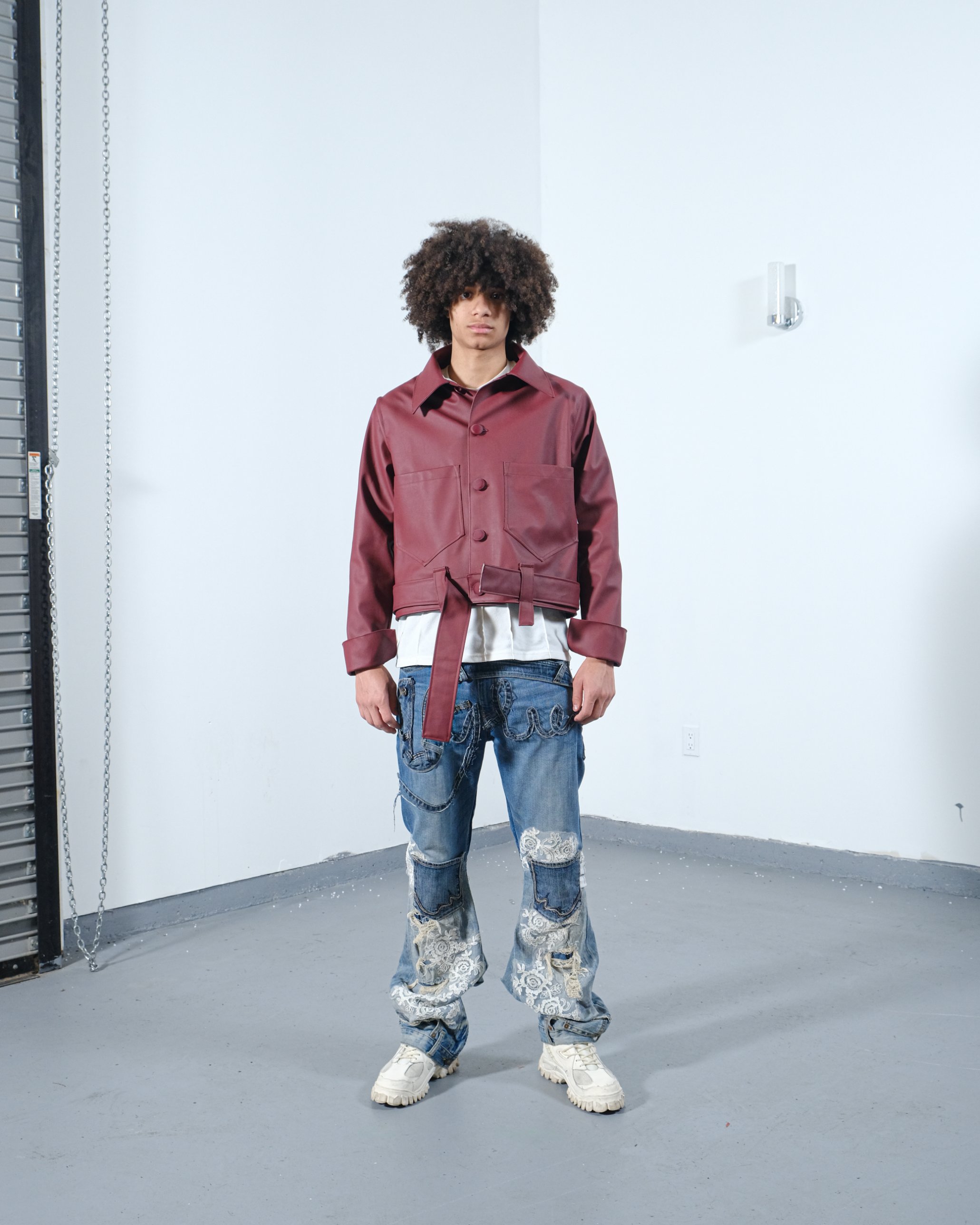 UGLIE look 02, oxblood leather jacket and lace-panel denim